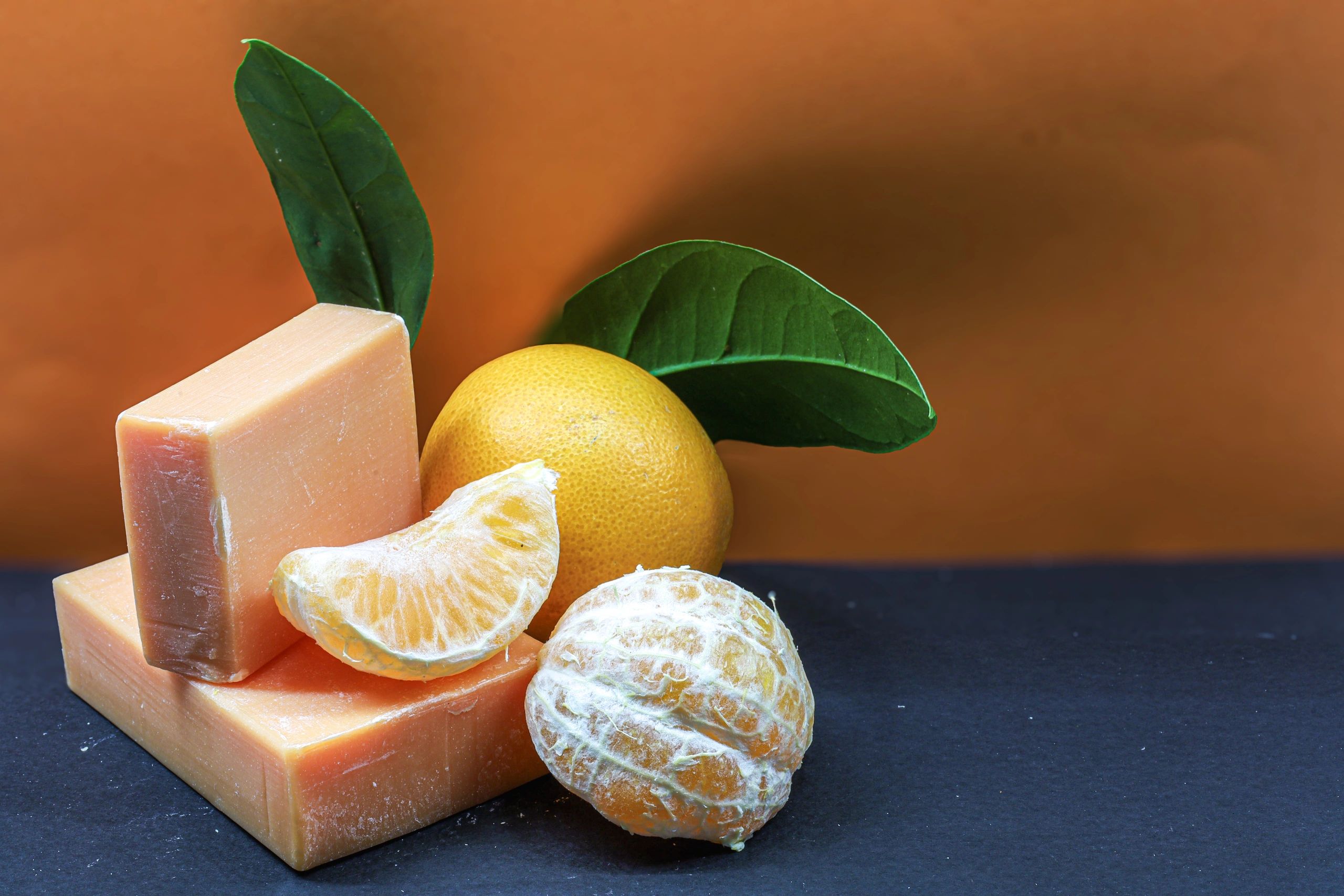 Handmade tangerine soap with fresh mandarin and leaves